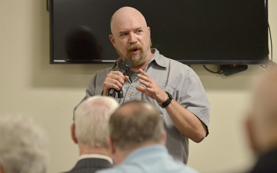 Terre Haute Police Det. Greg Ferency gives a presentation during the protecting places of worship forum on April 12, 2019, at St. George's Orthodox Church in Terre Haute, Ind. Ferency, a 30-year department veteran who had been a federal task force officer since 2010, was killed in an ambush shooting outside an FBI office in western Indiana, an FBI official said Thursday, July 8, 2021. (Joseph C. Garza/The Tribune-Star via AP)