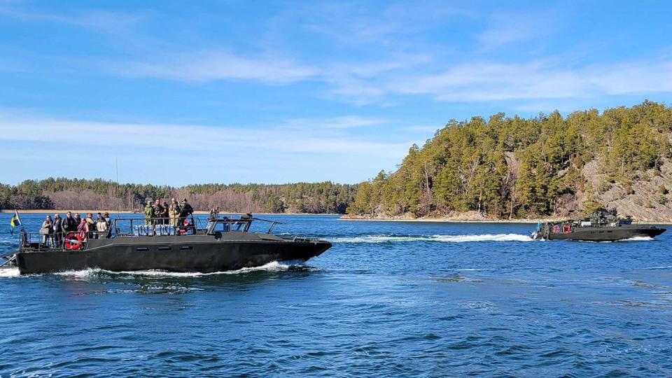 Two Swedish combat boats sail through an archipelago as part of U.S. Defense Secretary Lloyd Austin's tour of the country's naval capabilities at Muskö Naval Base, Sweden, April 19. (Rachel Cohen/Staff)