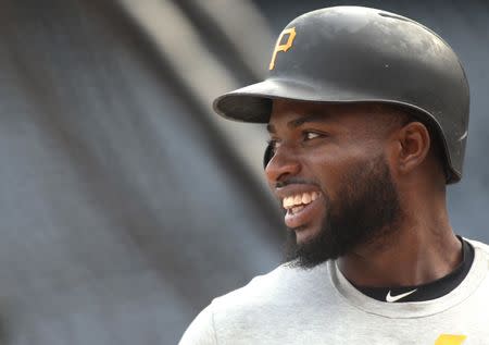 Sep 7, 2018; Pittsburgh, PA, USA; Pittsburgh Pirates right fielder Gregory Polanco (25) reacts at the batting cage before playing the Miami Marlins at PNC Park. Mandatory Credit: Charles LeClaire-USA TODAY Sports