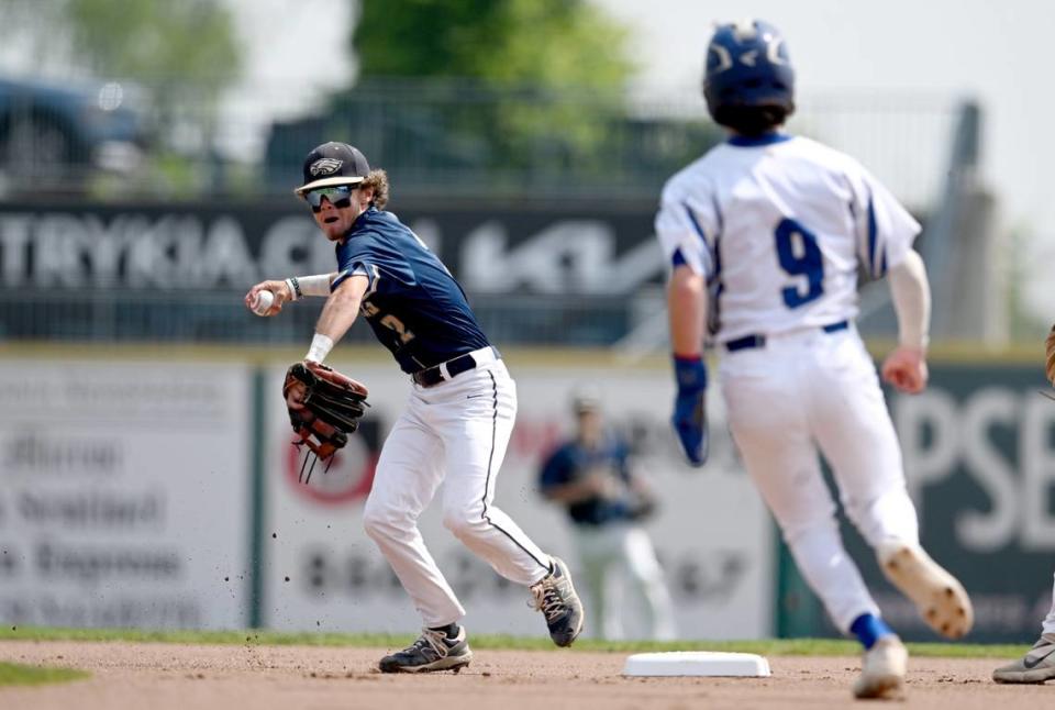 Bald Eagle Area’s Kahale Burns makes the out at second and throws to first for the double play during the PIAA Class 2A championship game against Mount Union at Medlar Field on Saturday, June 17, 2023.