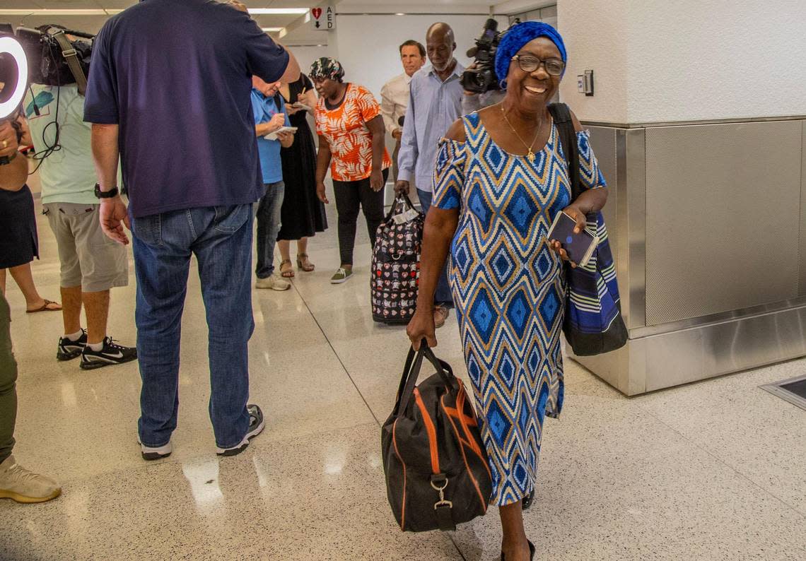 Acephie Etienne walks out of customs at Miami International Airport after arriving in the second State Department evacuation flight from Haiti’s Cap-Haïtien International Airport, on Thursday March 21, 2024.