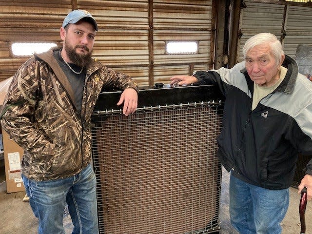 Sonny Anderson, owner, right, with grandson Blane Maxwell now sharing duties at Anderson Radiator.