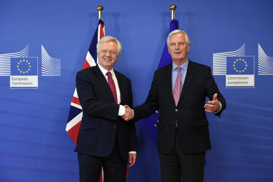 The Brexit Secretary with EU negotiator Michel Barnier in Brussels last week: AFP/Getty