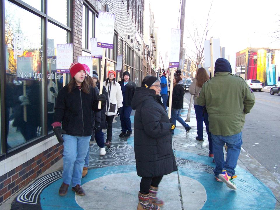 Despite frigid temperatures, workers at the Susan Knapp Health Center picketed on Tuesday morning to raise awareness of their efforts to negotiate a contract with Planned Parenthood.