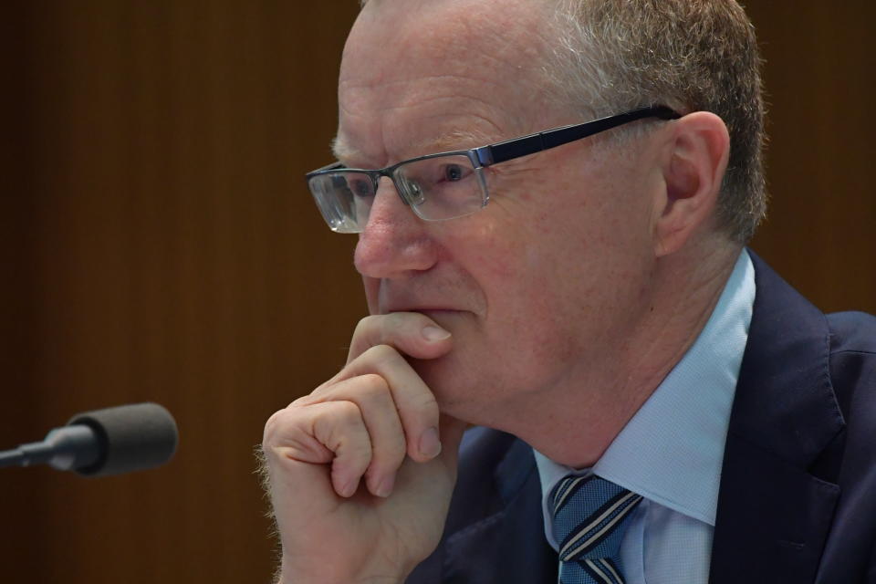 Reserve Bank governor Philip Lowe with his hand on his chin in a considered pose.