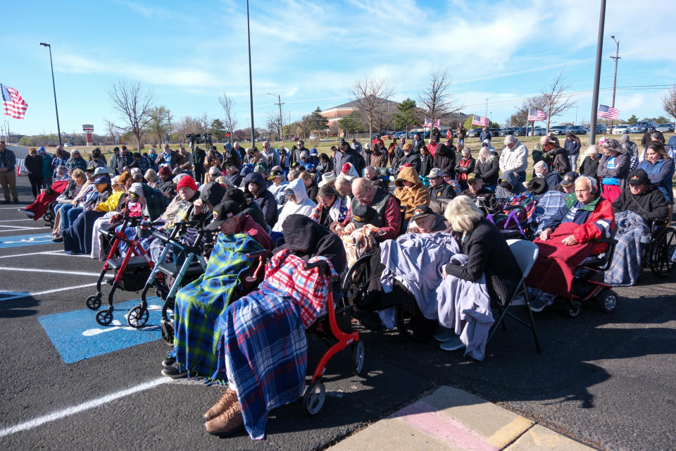 Veterans and families attend the opening ceremony for the Vietnam Traveling Memorial Wall Wednesday at the Ussery-Roan Texas State Veterans Home in Amarillo.