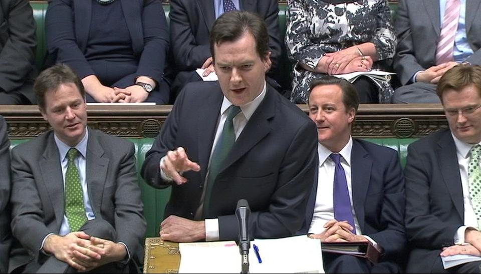 A still image from video shows Britain's Finance Minister George Osborne (2nd L), flanked by Prime Minister David Cameron, Treasury Minister Danny Alexander(R) and Deputy Prime Minister Nick Clegg (L), addressing parliament on about the outlook for the economy and the public finances, in London November 29, 2010. REUTERS/Parbul TV via Reuters TV  (BRITAIN - Tags: POLITICS BUSINESS) FOR EDITORIAL USE ONLY. NOT FOR SALE FOR MARKETING OR ADVERTISING CAMPAIGNS