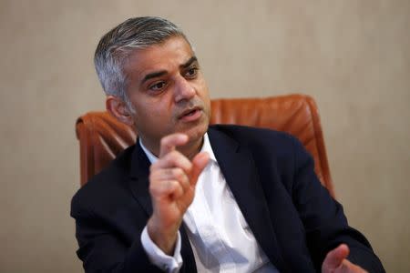 London mayoral candidate Sadiq Khan gestures during an interview with Reuters during an interview with Reuters at Canary Wharf in London, Britain November 17, 2015. REUTERS/Stefan Wermuth