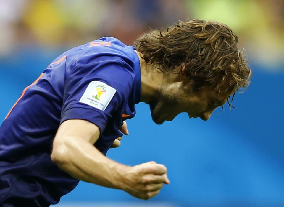 Daley Blind of the Netherlands celebrates scoring their second goal during their 2014 World Cup third-place playoff against Brazil at the Brasilia national stadium in Brasilia