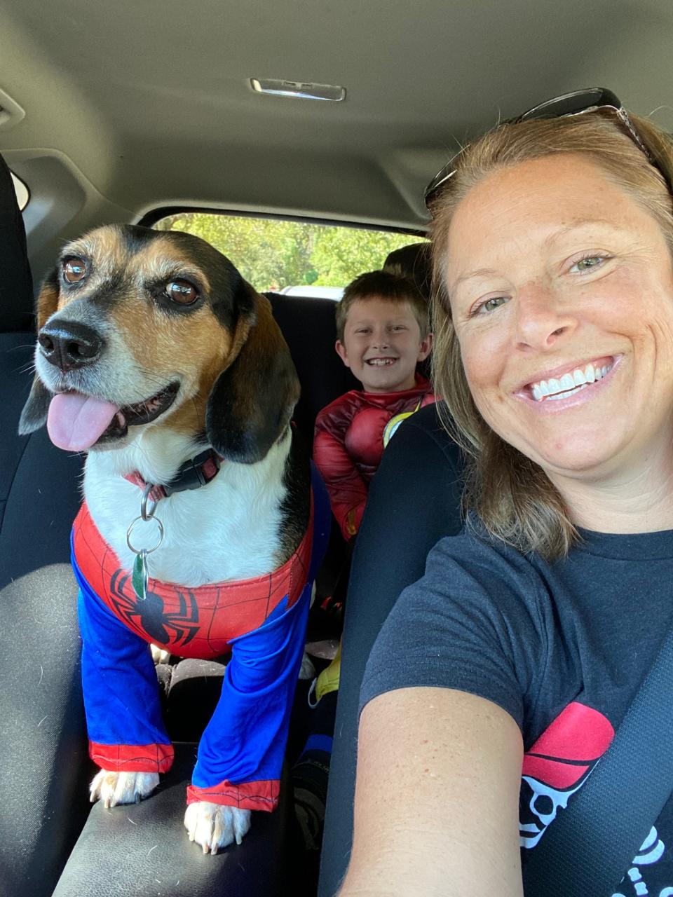 Wendi Cannon, with her beagle Benny and son, Tyler.