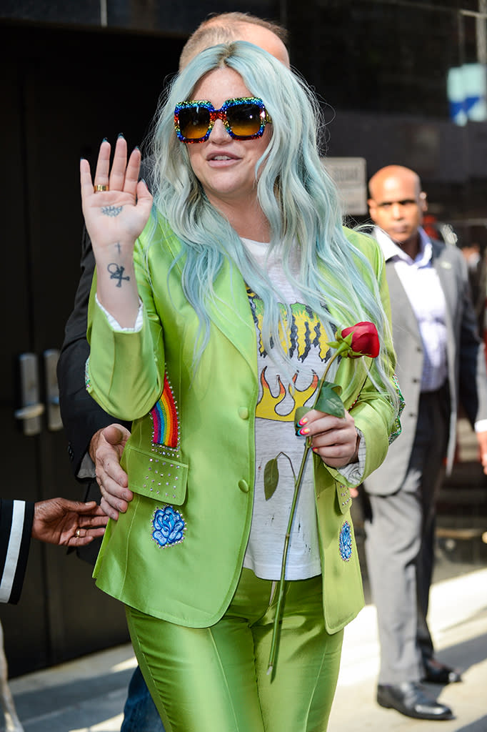 <p>Wearing a loud neon suit, as only Kesha would, the singer was back! She promoted <a rel="nofollow" href="https://www.yahoo.com/music/rainbow-connection-kesha-shows-true-colors-glorious-comeback-album-042201659.html" data-ylk="slk:Rainbow;elm:context_link;itc:0;sec:content-canvas;outcm:mb_qualified_link;_E:mb_qualified_link;ct:story;" class="link  yahoo-link"><i>Rainbow</i></a>, her first release in almost five years, on <i>Good Morning America</i>. (Photo: Ray Tamarra/GC Images) </p>