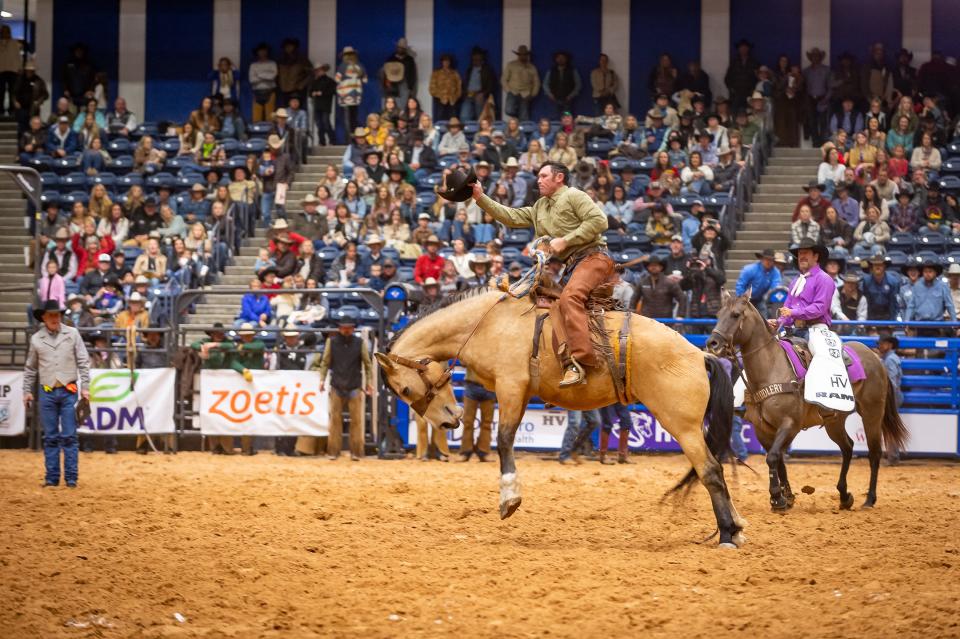 Waylon Davis of EC Cattle and Mule Creek Cattle scores a 78 in the Ranch Bronc Riding event during the first go around of the 2023 WRCA World Championship Ranch Rodeo. The rodeo continues at the Amarillo Civic Center through Sunday.