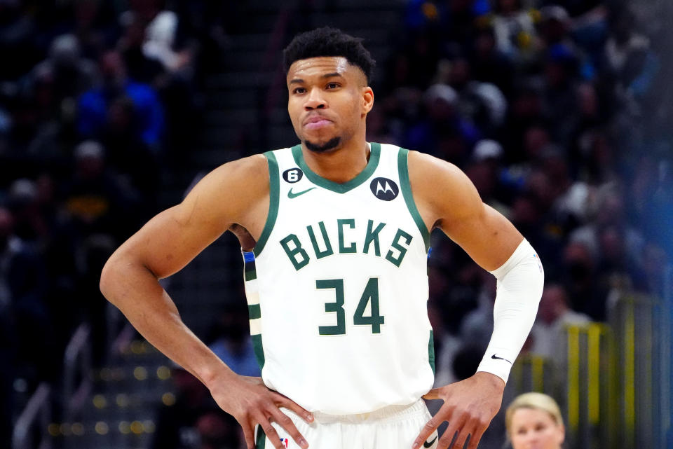 Giannis Antetokounmpo reportedly had offseason knee surgery. (Ron Chenoy/Reuters)