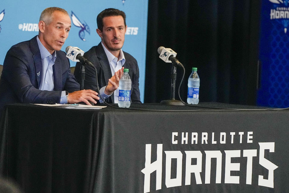 Rick Schnall, left, and Gabe Plotkin speak to the media during a news conference about the sale of the majority stake in the Charlotte Hornets NBA basketball team on Thursday, Aug. 3, 2023, in Charlotte, N.C. The sale of the majority stake of the Charlotte Hornets from six-time NBA champion Michael Jordan to Plotkin and Schnall has been finalized, the team announced Thursday. (AP Photo/Chris Carlson)