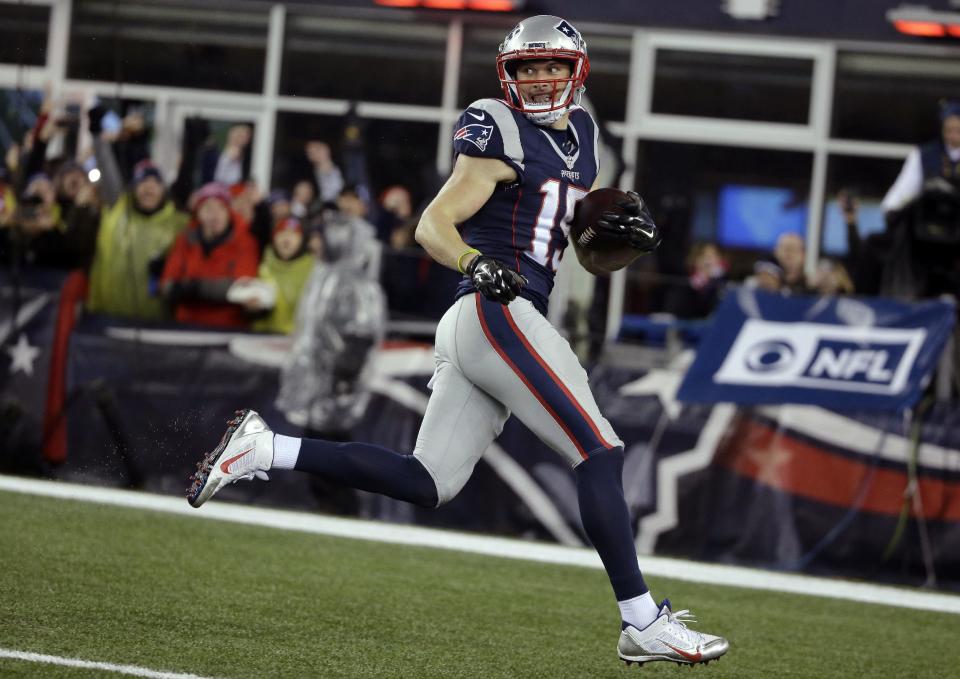 New England Patriots wide receiver Chris Hogan (15) looks back as he runs to the end zone for a touchdown during the first half of the AFC championship NFL football game against the Pittsburgh Steelers, Sunday, Jan. 22, 2017, in Foxborough, Mass. (AP Photo/Steven Senne)