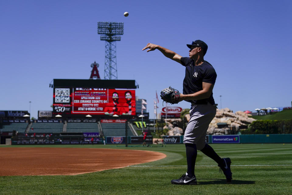 New York Yankees' Aaron Judge throws before a baseball game against the Los Angeles Angels in Anaheim, Calif., Wednesday, July 19, 2023. (AP Photo/Ashley Landis)