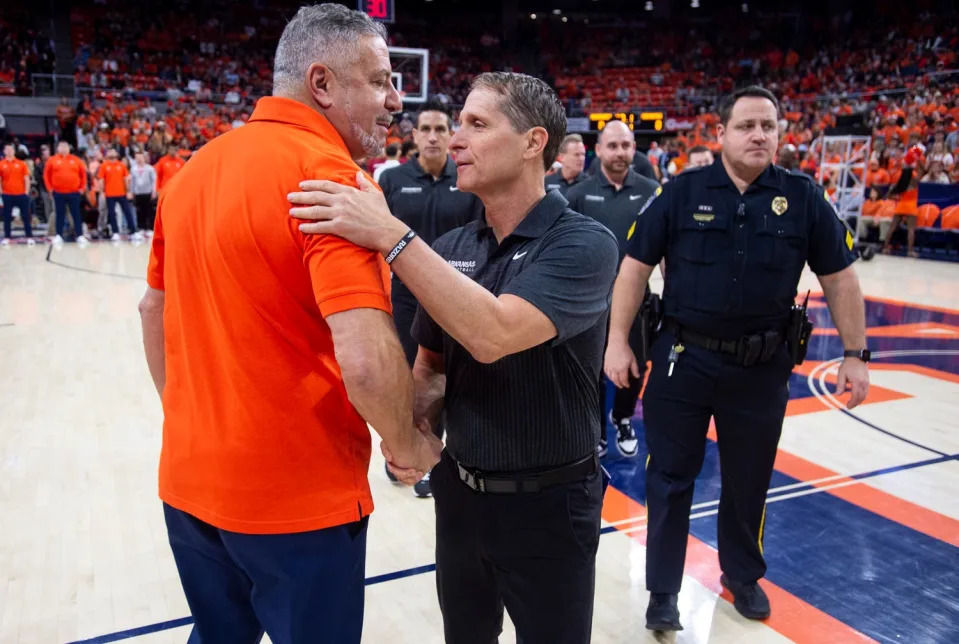 Auburn Tigers head coach Bruce Pearl and Arkansas Razorbacks head coach Eric Musselman shake hands before the game as Auburn Tigers take on Arkansas Razorbacks at Neville Arena in Auburn, Ala., on Saturday, Jan. 7, 2023.