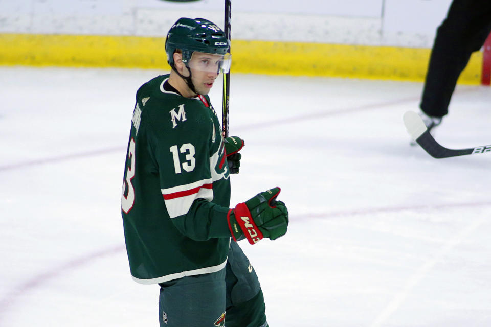 Minnesota Wild center Nick Bonino (13) celebrates his goal against the Vegas Golden Knights in the first period during an NHL hockey game, Monday, May 3, 2021, in St. Paul, Minn. (AP Photo/Andy Clayton-King)