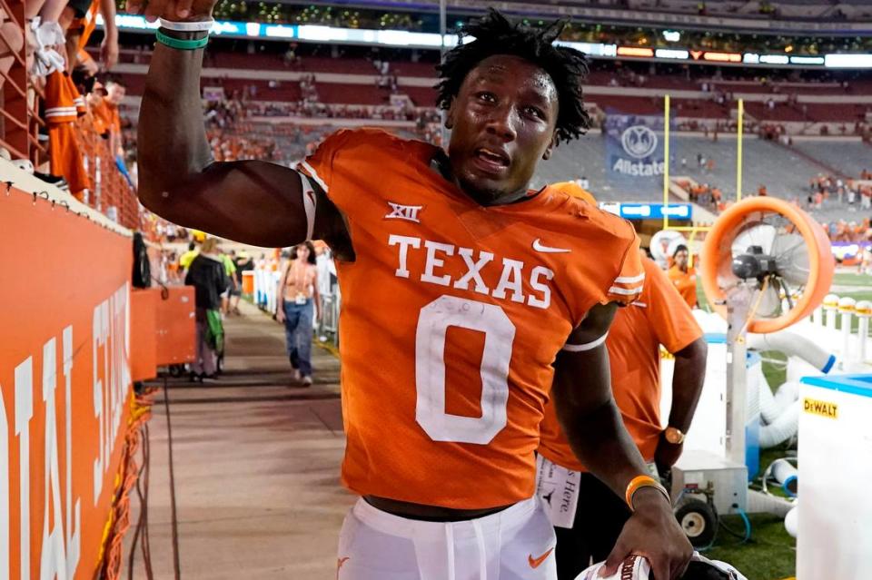 Oct 1, 2022; Austin, Texas, USA; Texas Longhorns linebacker DeMarvion Overshown (0) greets fans after a victory over the West Virginia Mountaineers at Darrell K Royal-Texas Memorial Stadium.