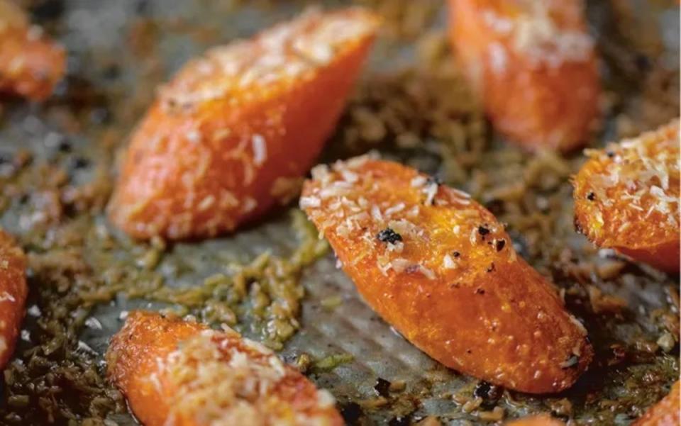 <p>Jessica Merchant</p><p>Only a handful of ingredients are needed for this unique and tasty side dish.</p><p><strong>Get the recipe: <a href="https://parade.com/1311220/parade/coconut-roasted-carrots/" rel="nofollow noopener" target="_blank" data-ylk="slk:Coconut Roasted Carrots;elm:context_link;itc:0;sec:content-canvas" class="link ">Coconut Roasted Carrots</a></strong></p>