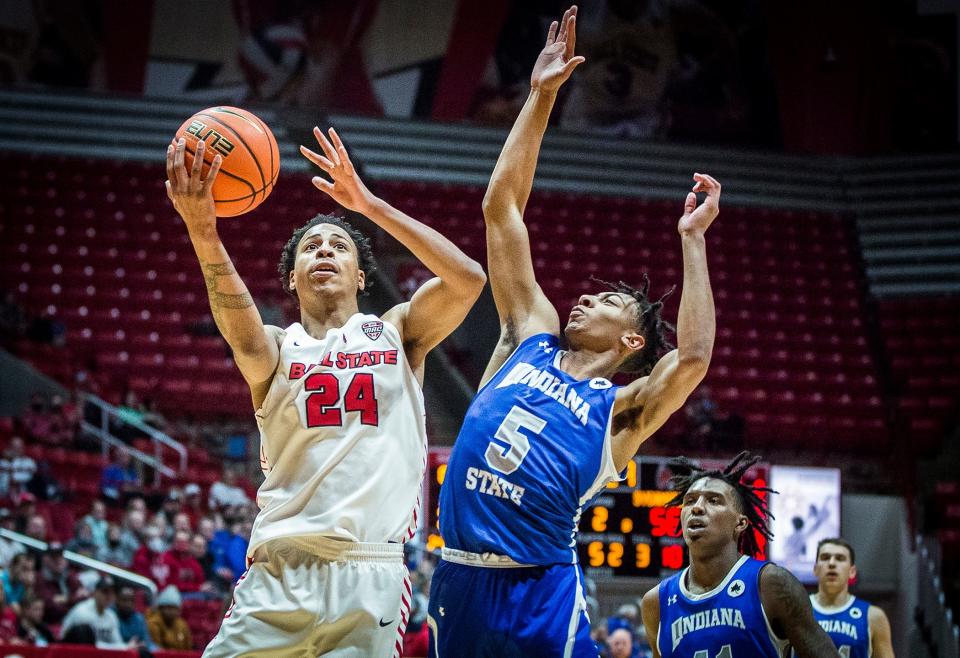 Ball State's Jalen Windham shoots past Indiana State's defense during their game at Worthen Arena Saturday, Nov. 27, 2021. 