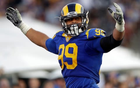 Los Angeles Rams defensive end Aaron Donald celebrates a fumble recovery and touchdown by defensive end Dante Fowler during the second half in an NFL football game against the Seattle Seahawks, in Los Angeles. Donald was the only unanimous choice for The Associated Press 2018 NFL All-Pro Team - Credit: AP