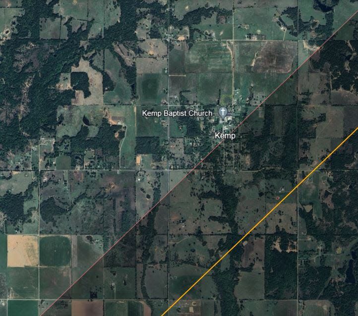 Expert John Irwin has recently published a new map with updated lines for the April 8 solar eclipse. Kemp, Oklahoma, was on the edge of the "classic" path of totality (the red line), but new data places the path of totality about 1,000 feet southeast of town (yellow line).