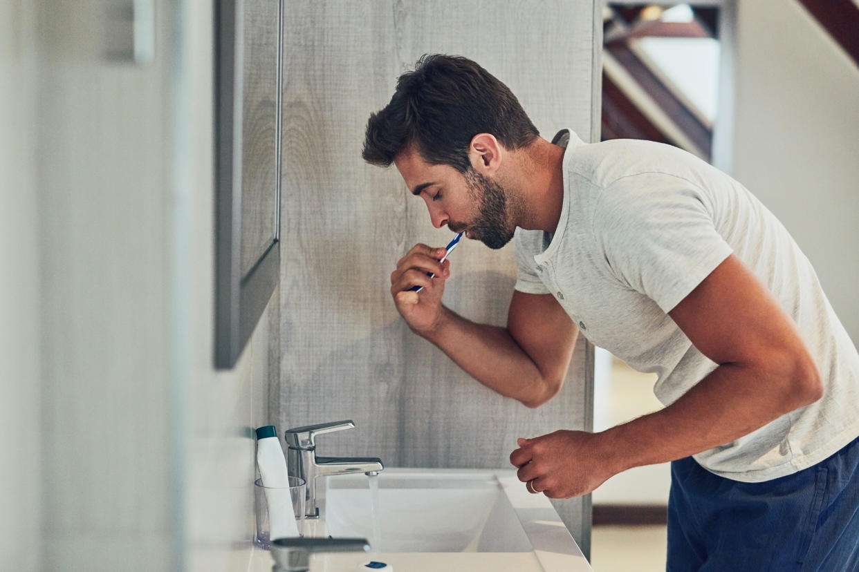 Researchers say that "improved oral hygiene care" may reduce the risk of heart failure. (Photo: Getty Images)