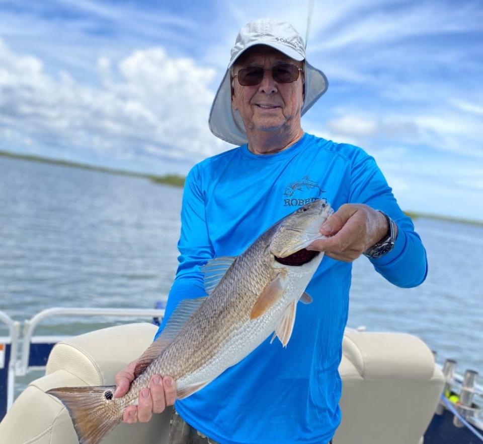 Art Mowery caught this slot-sized redfish Wednesday, the day before all reds became catch-and-release in the Indian River Lagoon.