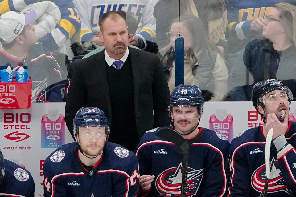 Nov 17, 2022; Columbus, Ohio, USA;  Columbus Blue Jackets head coach Brad Larsen watches from the bench during the second period of the NHL hockey game against the Montreal Canadiens at Nationwide Arena. Mandatory Credit: Adam Cairns-The Columbus Dispatch