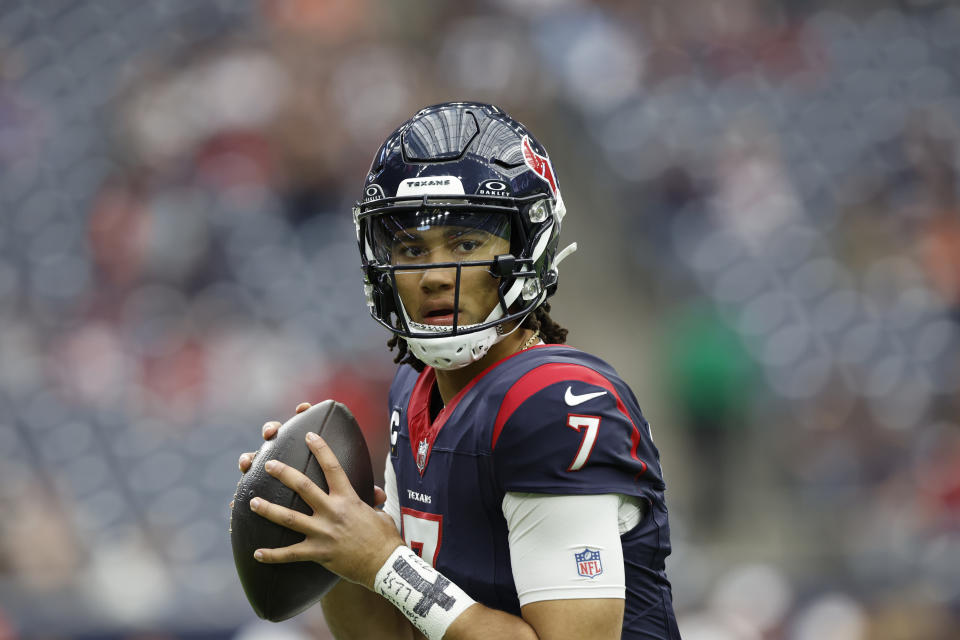 Houston Texans quarterback C.J. Stroud (7) looks to pass during pregame warmups before an NFL wild-card playoff football game, Saturday, Jan. 13, 2024 in Houston. (AP Photo/Matt Patterson)