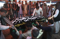 Afghan Hazaras attend the funeral of Mina Khiari, who was killed in bombing last week, in Kabul, Afghanistan, Saturday, June 5, 2021. After the collapse of the Taliban 20 years ago, Afghanistan's ethnic Hazaras began to flourish and soon advanced in various fields, including education and sports, and moved up the ladder of success. They now fear those gains will be lost to chaos and war after the final withdrawal of American and NATO troops from Afghanistan this summer. (AP Photo/Rahmat Gul)