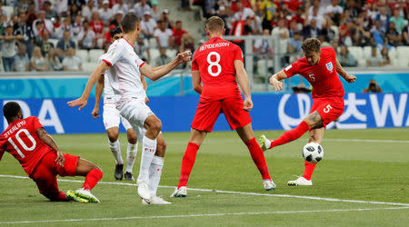 Soccer Football - World Cup - Group G - Tunisia vs England - Volgograd Arena, Volgograd, Russia - June 18, 2018 England's John Stones shoots at goal REUTERS/Toru Hanai