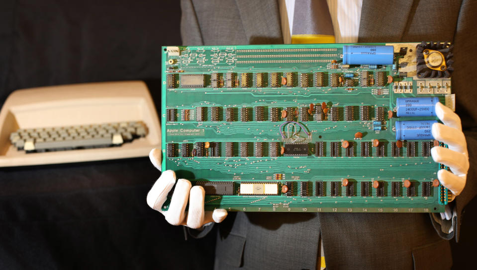 LONDON, ENGLAND - OCTOBER 09: An Apple-1 Personal Computer is displayed at Christie's on October 9, 2012 in London, England. Introduced in July 1976 the Apple-1 was sold without a casing, power supply, keyboard or monitor and buyers would have to supply their own. This rare personal computer has come from the estate of Joe Copson, a former Apple employee. The Apple-1 machine was designed and each model hand-built by Steve Wozniak. His friend Steve Jobs suggested a number of improvements, and handled it's sale and marketing. When offered at auction in Christie’s sale of Travel, Science and Natural History on October 9, 2012 it is expected to fetch between £50,000 and £80,000. (Photo by Peter Macdiarmid/Getty Images)