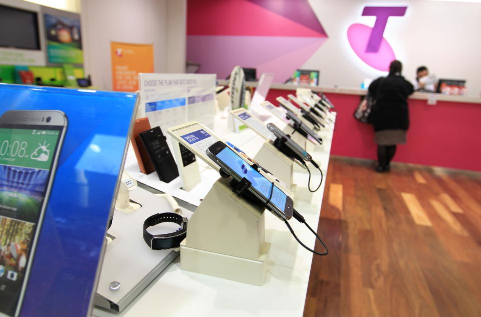 SYDNEY, AUSTRALIA – JULY 24: Mobile phones products and consumer telecommunications technology on display in a Telstra retail store in Sydney on July 24, 2014 in Sydney, Australia. (Photo by James Alcock/Getty Images)
