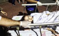 A wounded girl from the Ataturk Airport suicide bomb attack is carried to the Bakirkoy Sadi Konuk Hospital, in the early hours of June 29. Photo: Getty