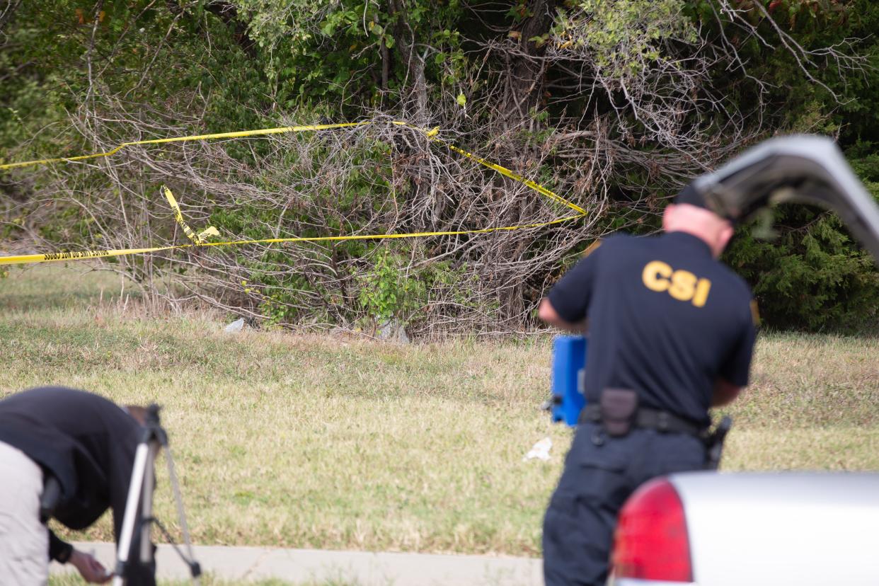 Crime scene investigators use equipment in an area next to Capital City Transportation, 2018 S.E. 28th St., Tuesday after Mickel Cherry was arrested in connection with rape and first-degree murder in the death of 5-year-old Zoey Felix.