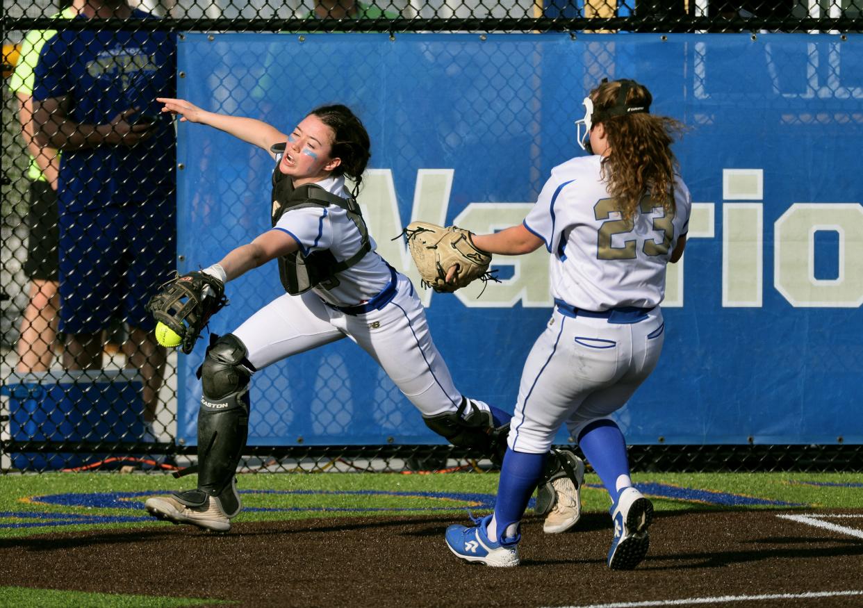 Schroeder catcher Sarah Ferruzza can’t get to this pop foul against Thomas. 