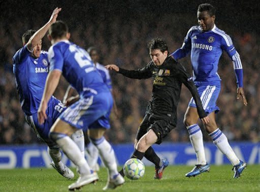 Barcelona's Argentine forward Lionel Messi (C) vies for the ball with Chelsea's Nigerian midfielder John Obi Mikel (R) and English defender John Terry (L) during the UEFA Champions League semi-final first leg football match at Stamford Bridge in London. Chelsea won 1-0