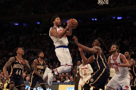 Dec 20, 2016; New York, NY, USA; New York Knicks guard Derrick Rose (25) drives to the basket past \Indiana Pacers center Myles Turner (33) during the second half at Madison Square Garden. Mandatory Credit: Adam Hunger-USA TODAY Sports