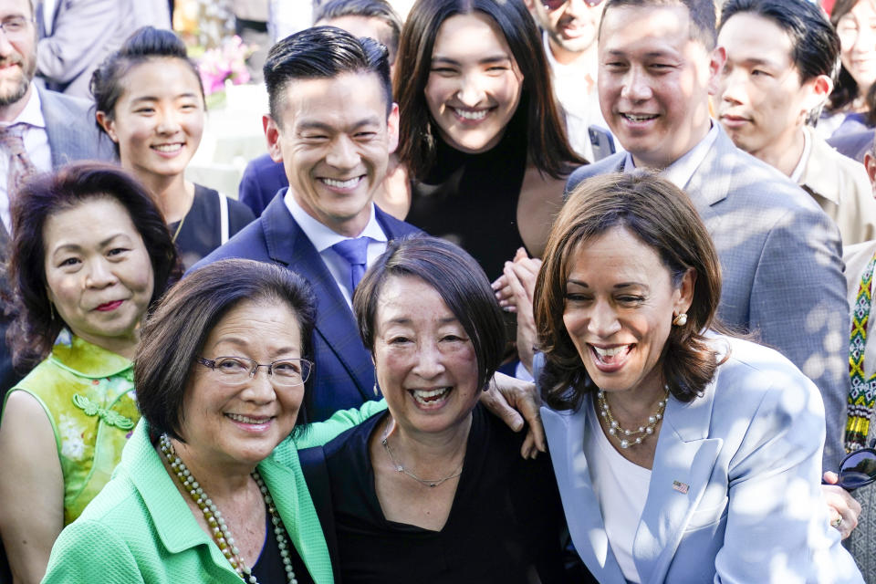 FILE - Vice President Kamala Harris takes a photo with Sen. Mazie Hirono, D-Hawaii, left, and others, in the Rose Garden of the White House in Washington, May 17, 2022, during a reception to celebrate Asian American, Native Hawaiian, and Pacific Islander Heritage Month. President Joe Biden’s reelection campaign is launching its formal outreach campaign to Asian-American voters, putting Vice President Kamala Harris at the forefront of the effort with events in Nevada and Pennsylvania this week. (AP Photo/Susan Walsh, File)