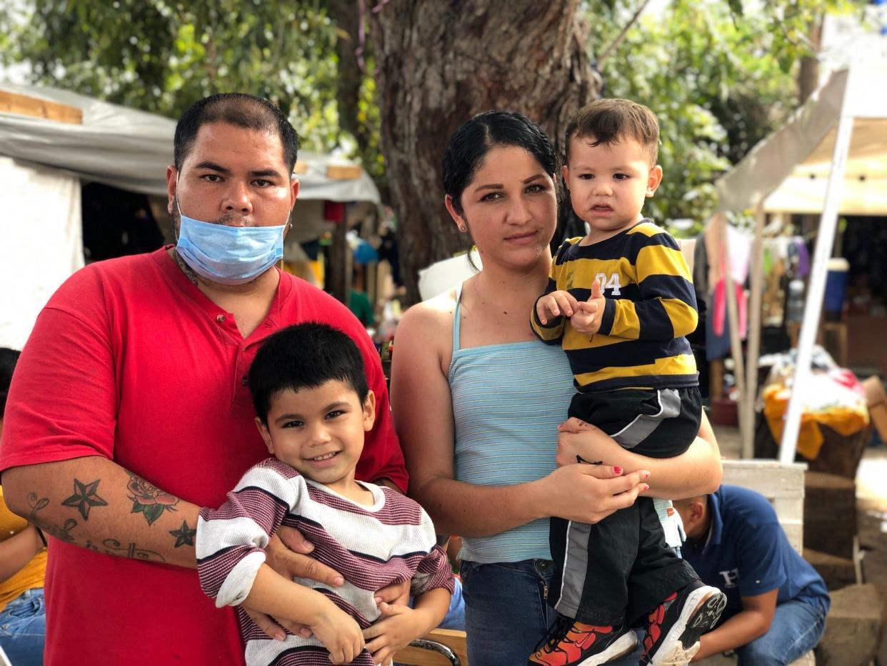 Oscar Aviles Ochoa, his wife, Brenda Figueroa, and two sons, José, 3, and Jesus, 1, have been living in a migrant shelter in Nuevo Laredo, Mexico, since fleeing his native Michoacán, Mexico, last month.