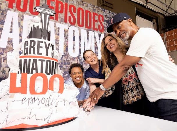 PHOTO: In this May 2, 2022, file photo, Chandra Wilson, Ellen Pompeo, Krista Vernoff, and James Pickens, Jr., celebrate the 400th episode milestone of 'Grey's Anatomy,' with a cake-cutting ceremony on the set in Los Angeles. (Liliane Lathan/ABC via Getty Images, FILE)