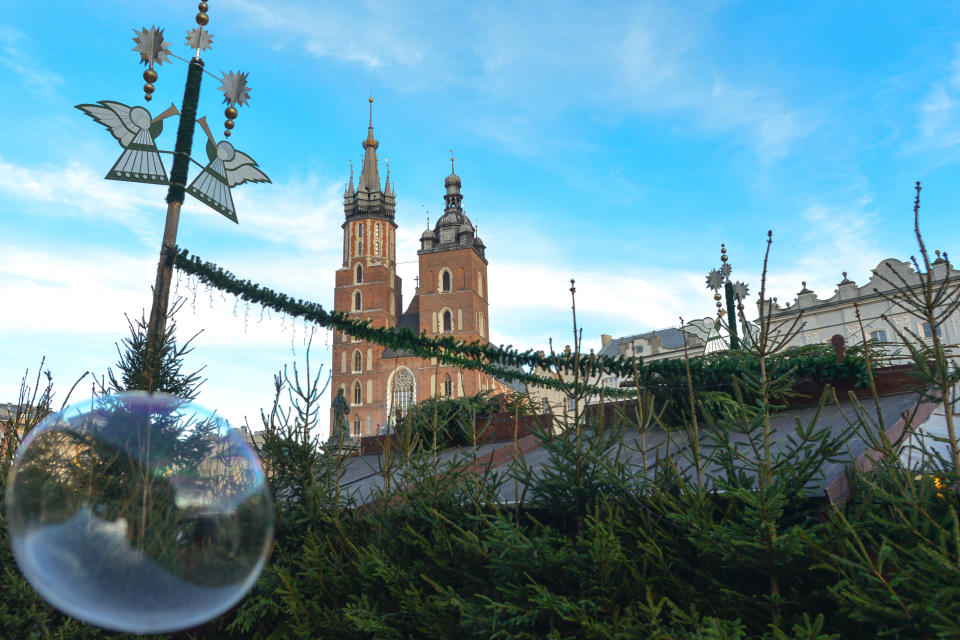 <p>A view of Krakow’s Main Square Christmas decorations during the day time. On Sunday, 10 December 2017, in Krakow, Poland. (Photo by Artur Widak/NurPhoto) </p>