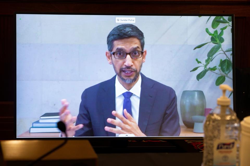 CEO of Alphabet Inc. and its subsidiary Google LLC, Sundar Pichai, appears on a monitor as he testifies remotely during a hearing to discuss reforming Section 230 of the Communications Decency Act with big tech companies on October 28, 2020 in Washington, DC. - US senators and tech CEOs girded for a clash Wednesday over a law making online services immune from liability for third-party content at a hearing set to debate Silicon Valley's handling of social media. (Photo by MICHAEL REYNOLDS / POOL / AFP) (Photo by MICHAEL REYNOLDS/POOL/AFP via Getty Images)