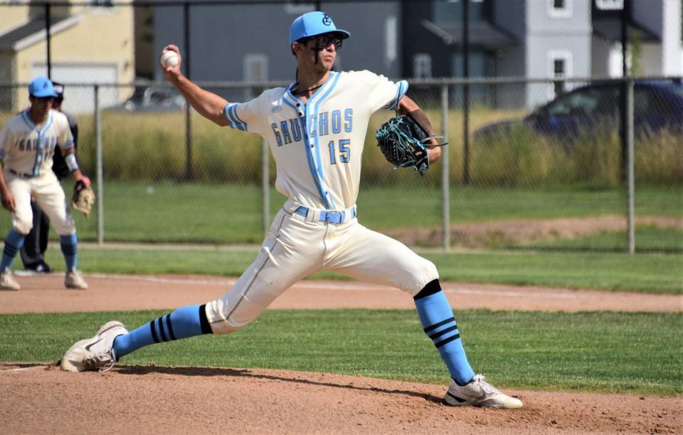El Capitan High School pitcher Mitchell Hunter delivers a pitch during a playoff game against Bear Creek on Tuesday, May 9, 2023 at El Capitan High School.