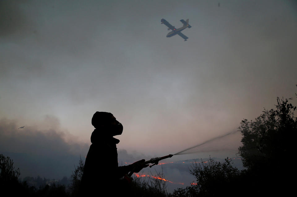 Massive wildfires tear across Israel