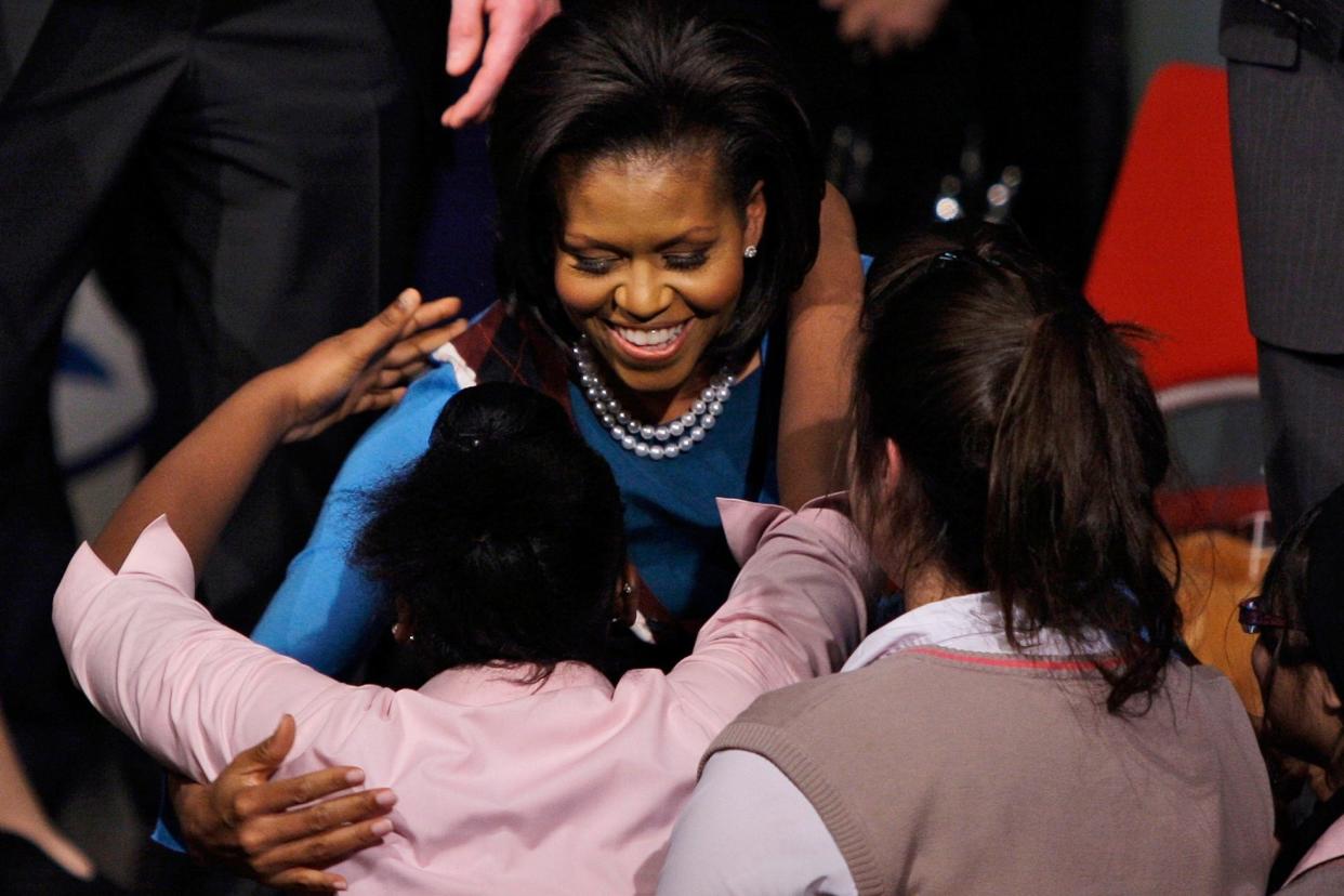 Michelle Obama at Islington's Elizabeth Garrett Anderson School in 2009: AP