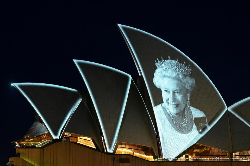 An image of Britain's Queen Elizabeth is illuminated on the sail of Sydney Opera House, following the Queen's passing, in Sydney, Australia, September 9, 2022. REUTERS/Jaimi Joy     TPX IMAGES OF THE DAY