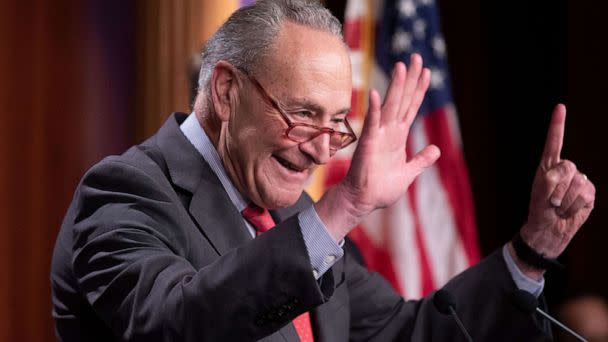 PHOTO: Chuck Schumer makes a gesture to represent the number 'fifty-one', during a news conference held to discuss the expansion of Democrats' majority in the Senate, on Capitol Hill in Washington D.C. Dec. 7, 2022. (Michael Reynolds/EPA-EFE/Shutterstock)